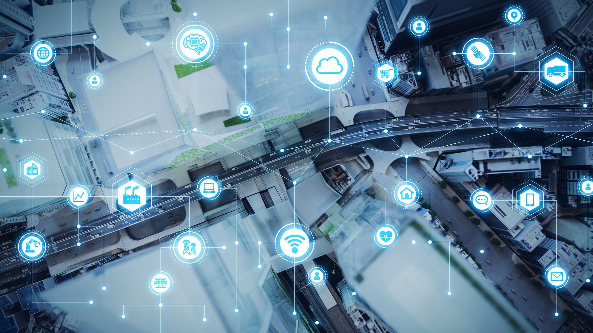 Straße von oben, überlagert mit Icons, die Digitalisierung verdeutlichen