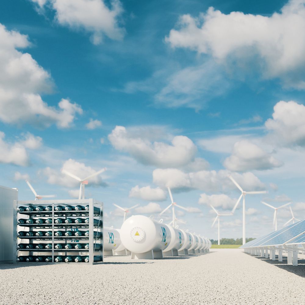 Wasserstoff Energiespeichersystem mit Windrädern und Solarpanelen 
